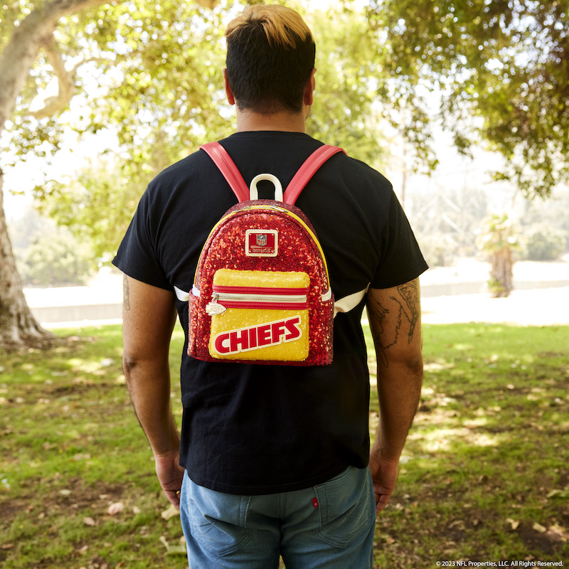 Image of man facing away from camera wearing the NFL Kansas City Chiefs Sequin Mini Backpack 